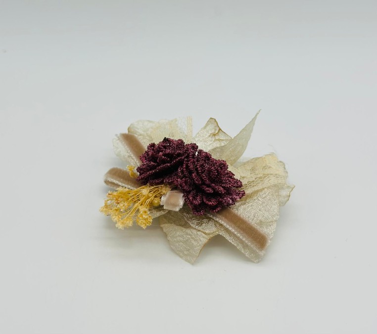 PINZA FLOR BURDEOS